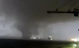 Tornado passing over stormy seas of the Mississippi River