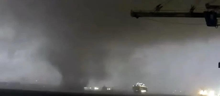 Tornado passing over stormy seas of the Mississippi River